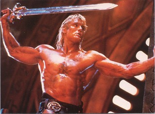 Featured is a postcard depicting Masters of the Universe He-Man published by Athena Art Cards in 1987. The original card is for sale in The unltd.com Store.